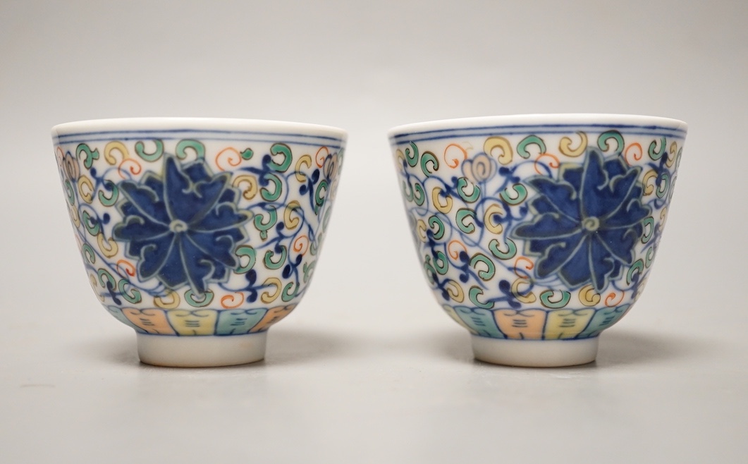 A pair of Chinese doucai cups 6cm